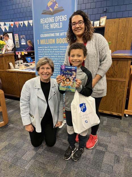 Jayveon, a 3rd grader at Cloud Elementary with his mother, Victorya and AFT President Randi Weingarten at a Reading Opens the World event with AFT Kansas and United Teachers of Wichita.